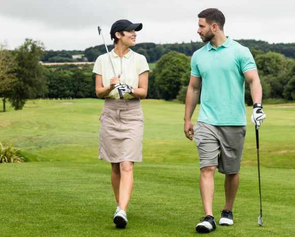 couple playing golf 