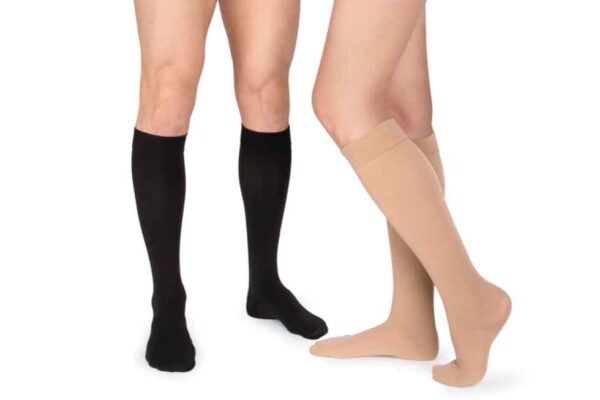 woman and man wearing compression stockings