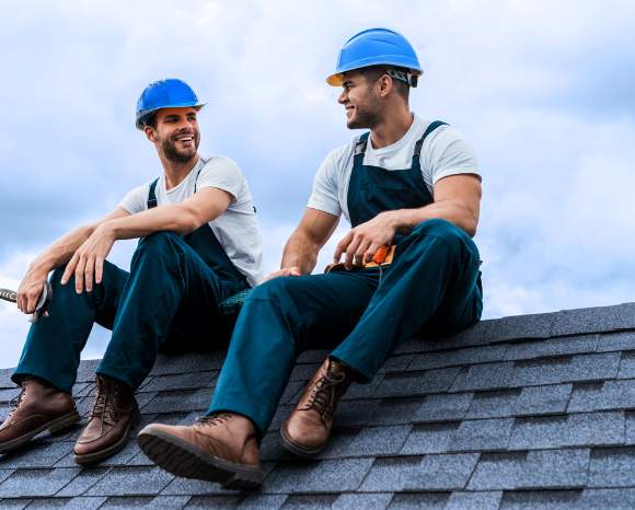 men working on roof