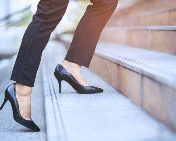 woman walking up stairs