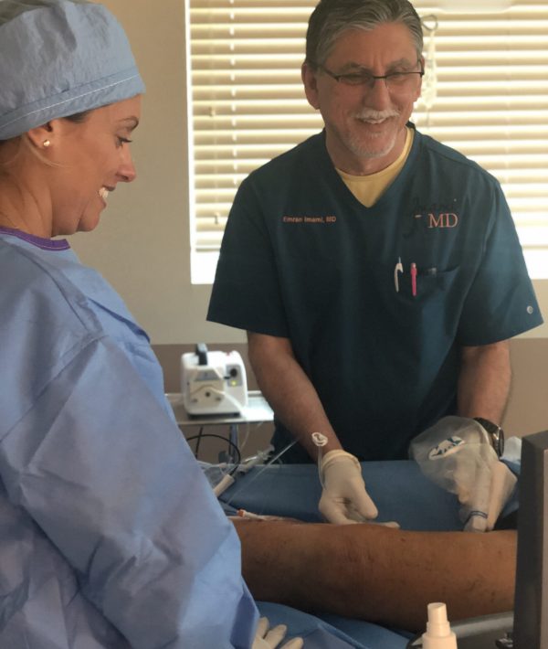 Doctor starting vein treatment