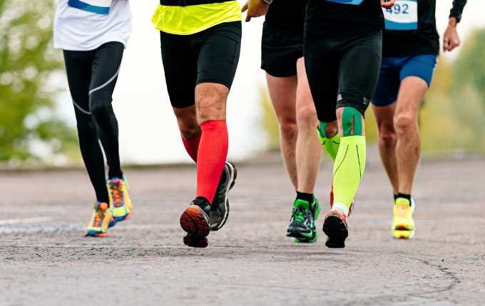 runners wearing compression stockings